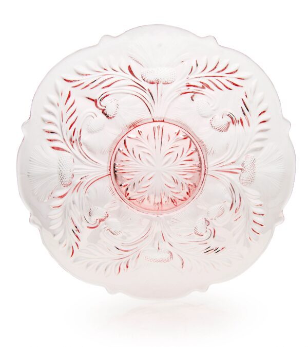 Intricately designed frosted glass bowl with pink floral patterns.