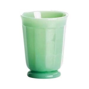 Vintage green jadeite glass cup with a sturdy base.
