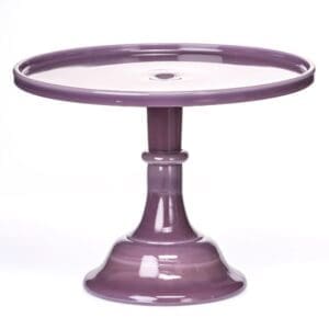 Purple ceramic cake stand with a round top and pedestal base.