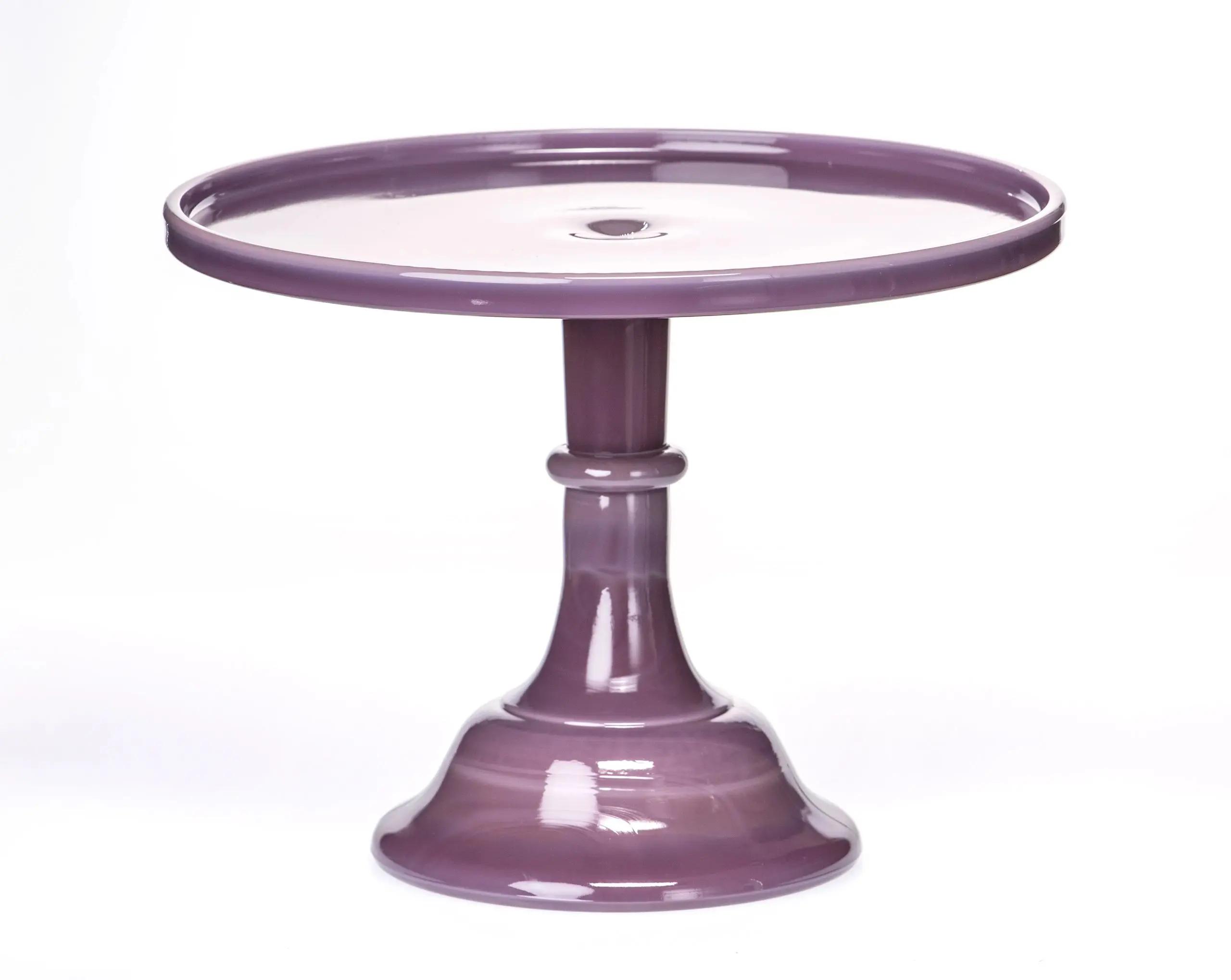 Purple ceramic cake stand with a round top and pedestal base.