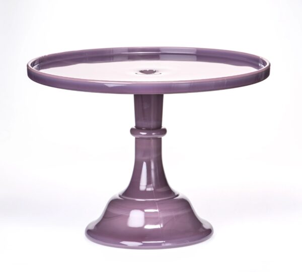 Purple ceramic cake stand with a pedestal base and round top.