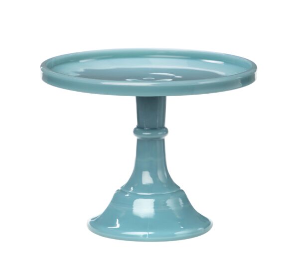 A blue ceramic cake stand with a pedestal base.