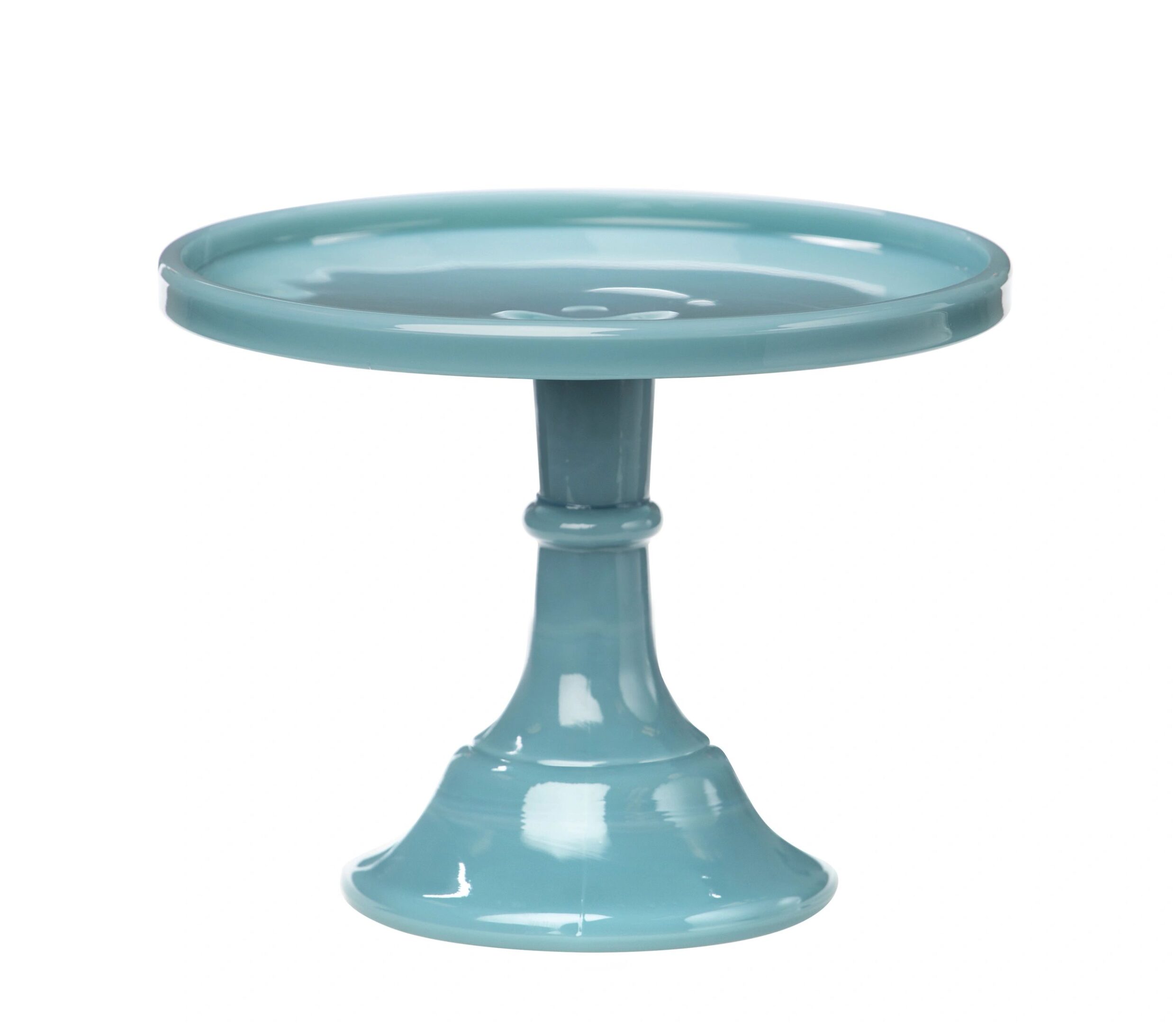 A blue ceramic cake stand with a pedestal base.