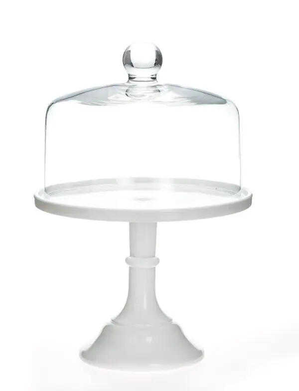 White pedestal cake stand with glass dome cover.