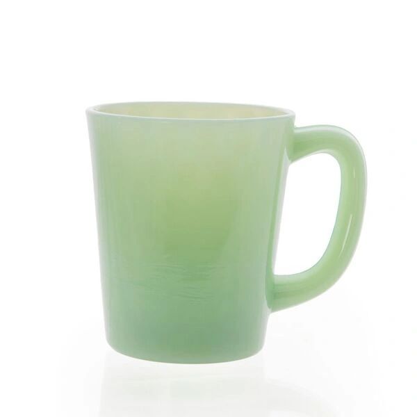 A green frosted glass coffee mug with a handle.