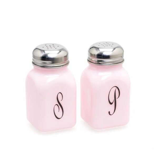 Pink salt and pepper shakers with silver tops and elegant letters S and P.