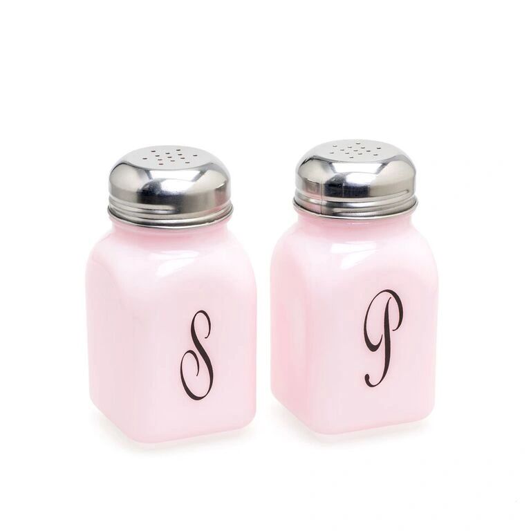 Pink salt and pepper shakers with silver tops and elegant letters S and P.