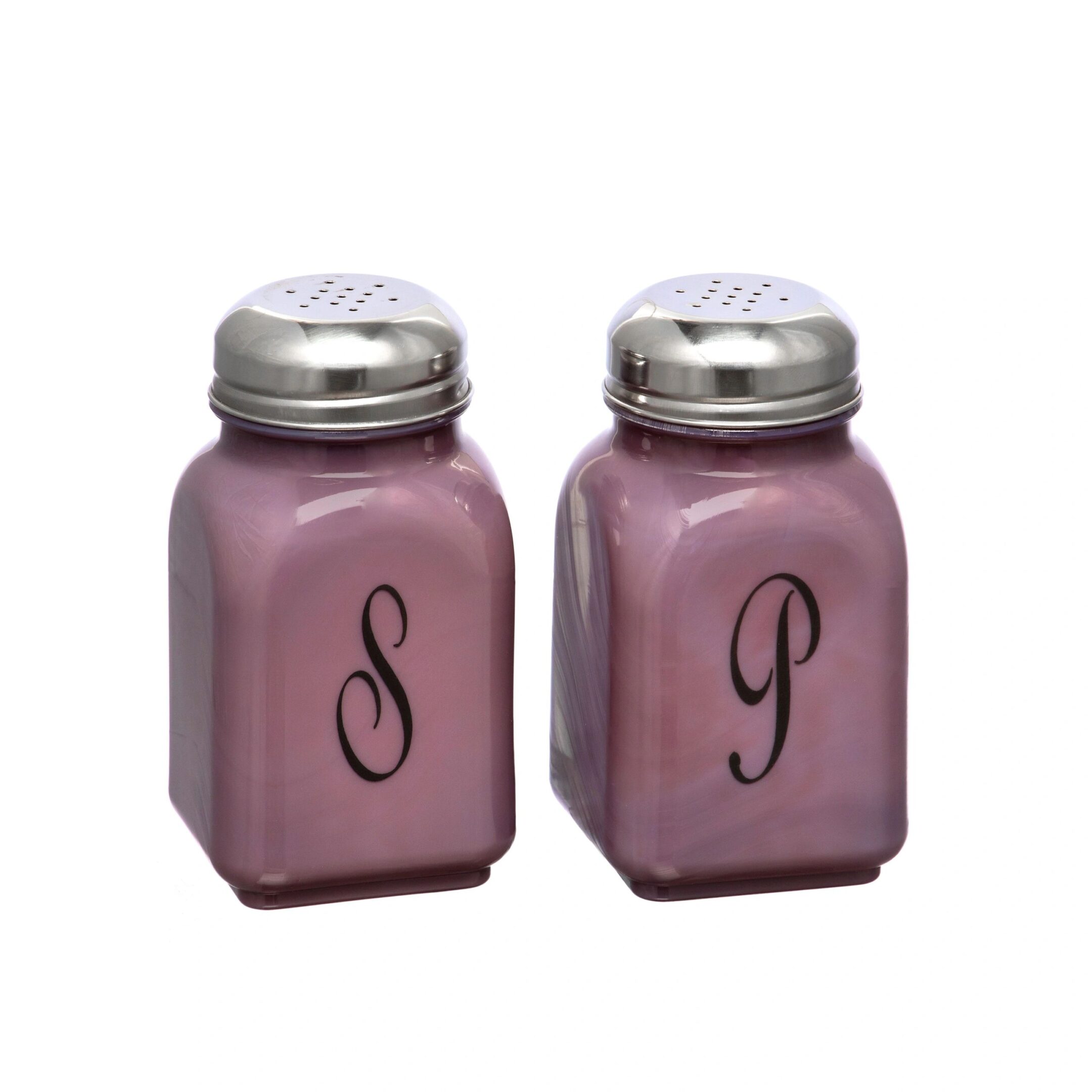 A pair of pink salt and pepper shakers with silver tops and initials S and P.