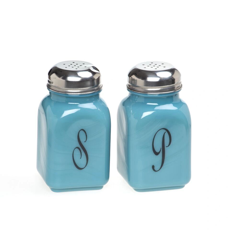 Blue salt and pepper shakers with silver tops and black script letters.