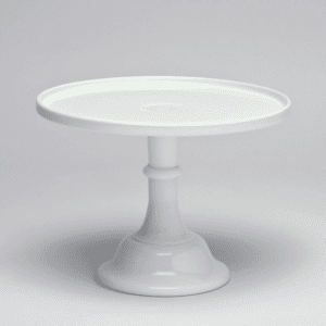 White ceramic cake stand with a pedestal base.