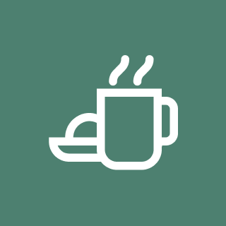 A simple icon of a steaming coffee cup and saucer.